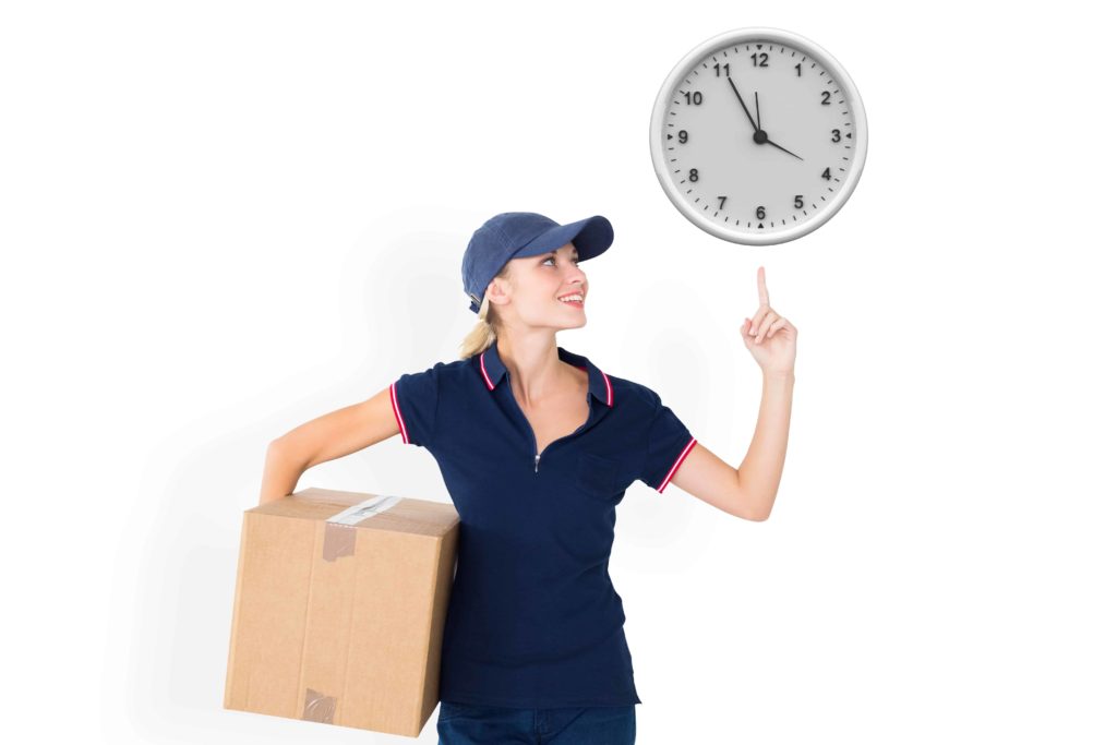 Image of woman pointing to the time on a clock
