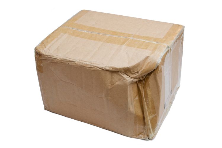 Photo of a damaged box caused by using incorrect packaging, one of the most common shipping mistakes