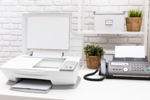 Photo of a fax machine on a desk