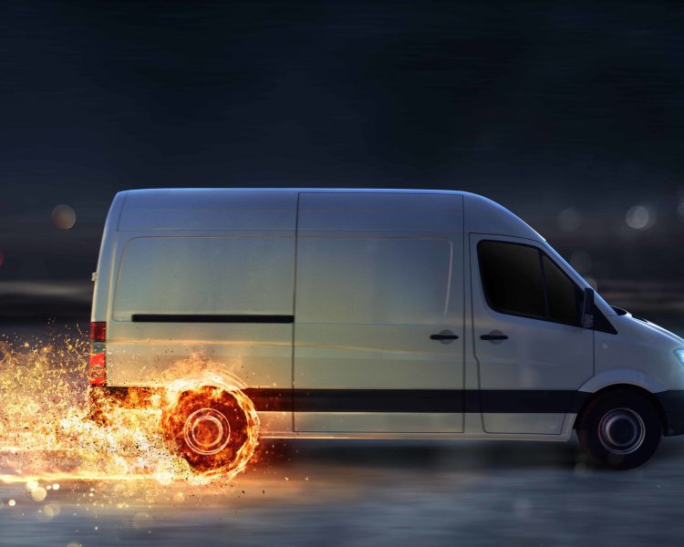 Photo of a speeding van to emphasize the importance of delivery speed when choosing a shipping service